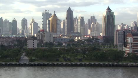 cityscape of shanghai, china filmed from the harbor area