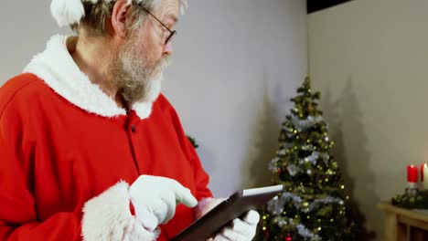 santa claus using digital tablet