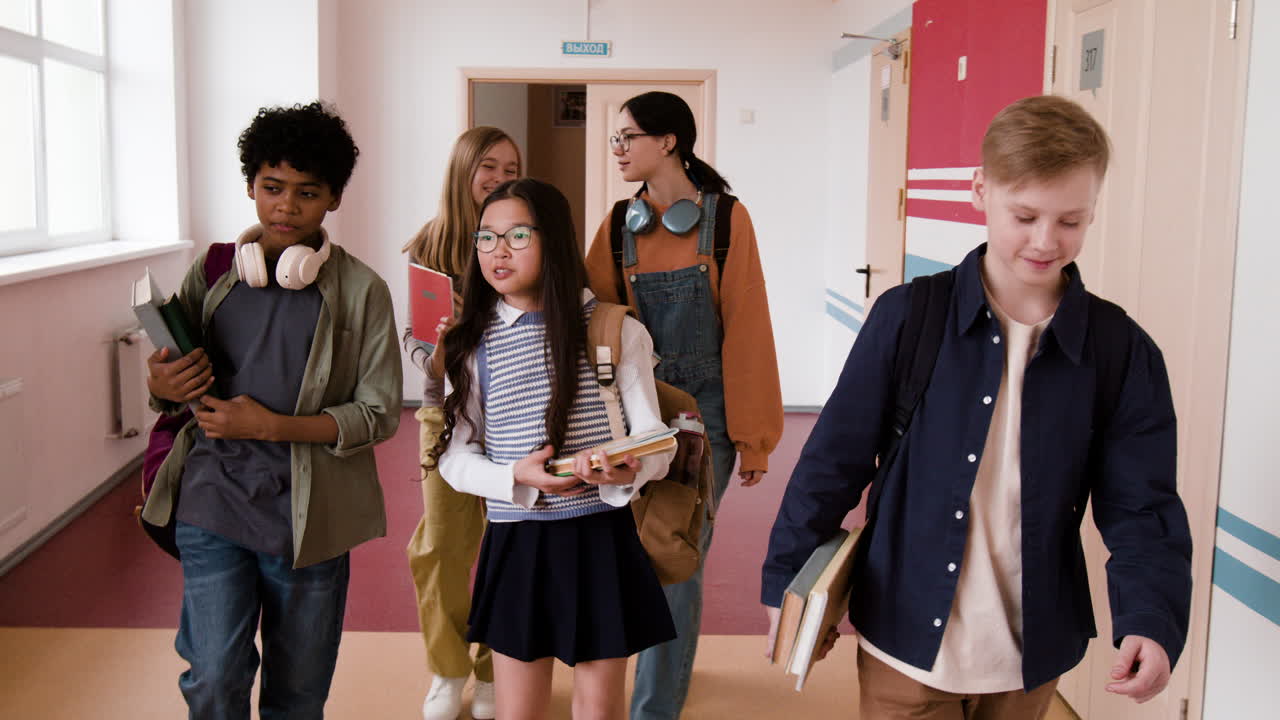 Diverse Group of Students Walking in a School Hallway