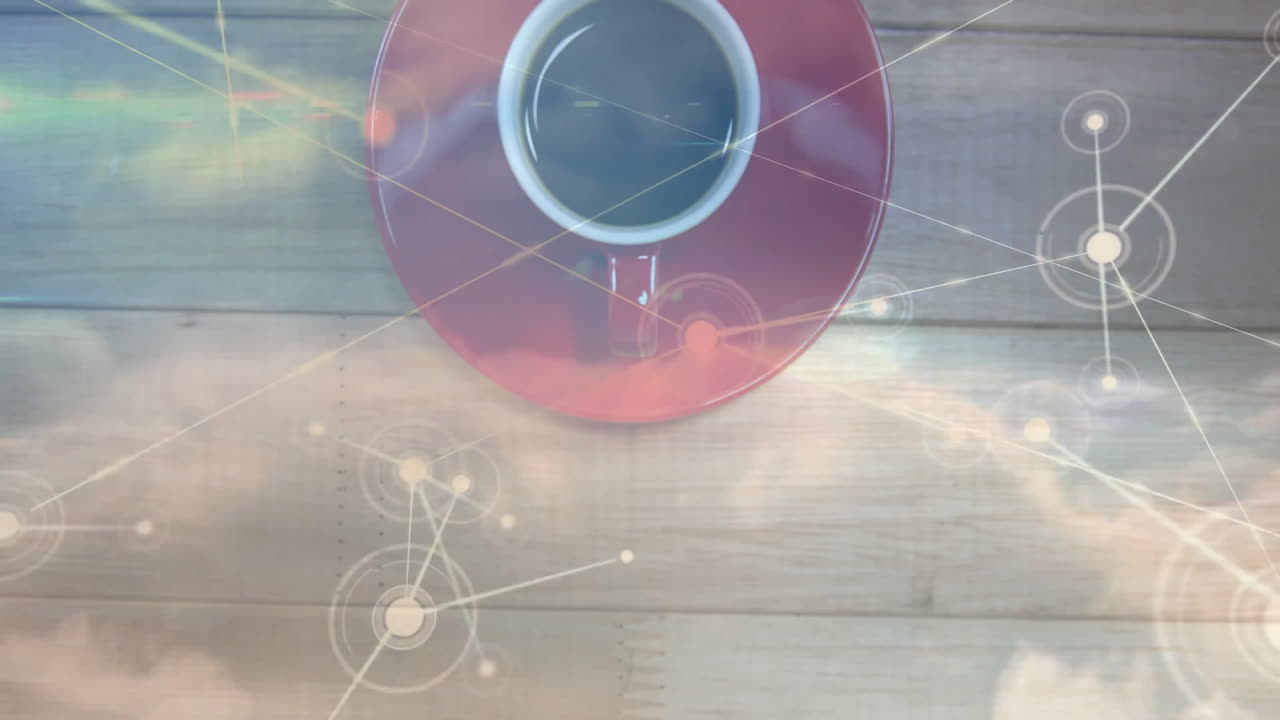 Red ceramic coffee cup sitting on wooden table showing network graphics blending in flat design