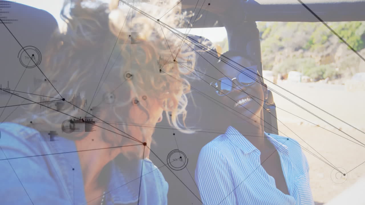 Two people in car laughing with data processing animation overlay