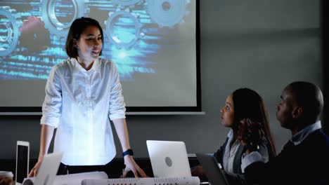 businesswoman giving presentation in conference room 4k