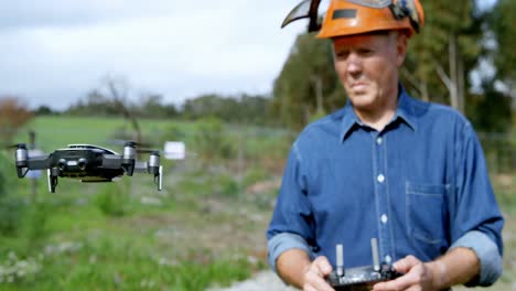 lumberjack operating drone in forest 4k