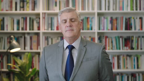 portrait of mature caucasian businessman boss checking wrist watch time preparing for meeting smiling confident at camera in library office study