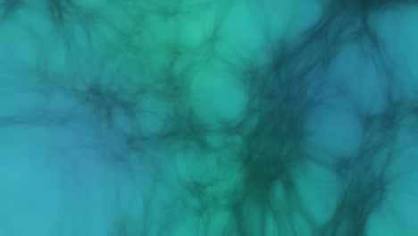 dark strange threads of a spiderweb moving on a blue green background