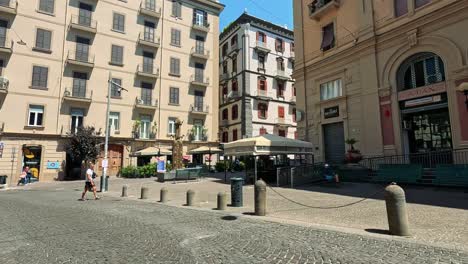 people walking near historic buildings in naples