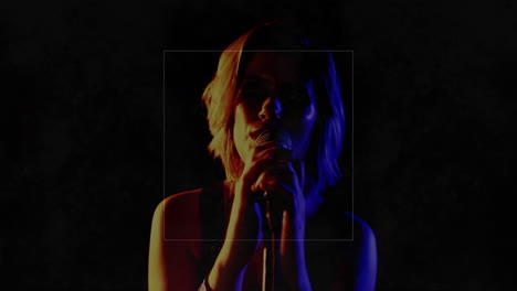 female singer performing music on dark stage, with animated audio waves and glowing light graphics