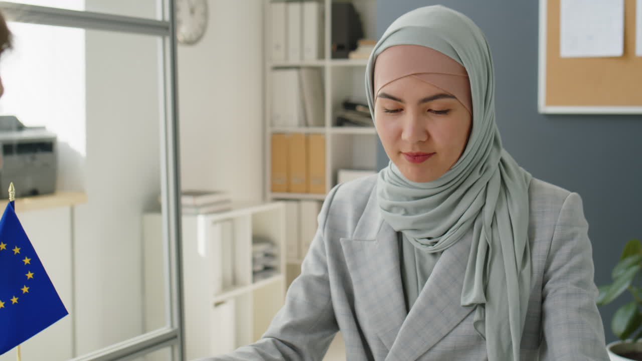 Business Meeting or Interview with a Woman Wearing Hijab