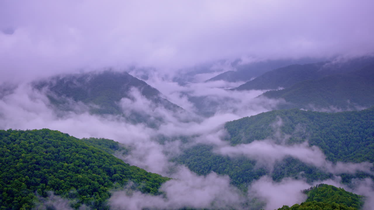 The fog rolls in over the Smoky Mountains in this dramatic drone clip