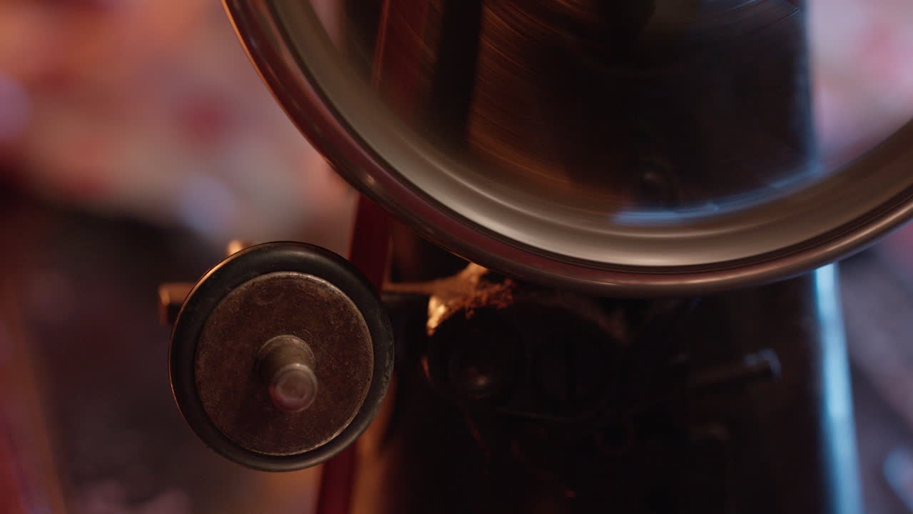 Close-up of a Vintage Machine's Spinning Wheel Mechanism