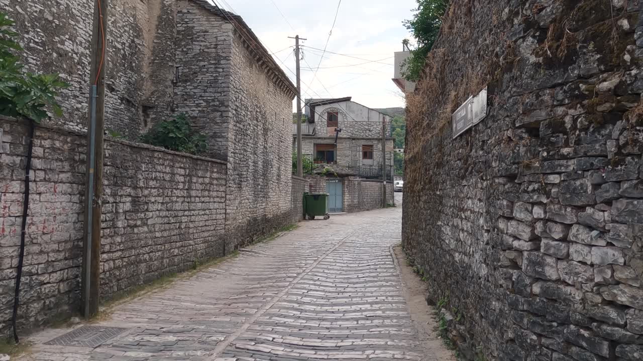 Narrow cobblestone street in Gjirokaster, Albania