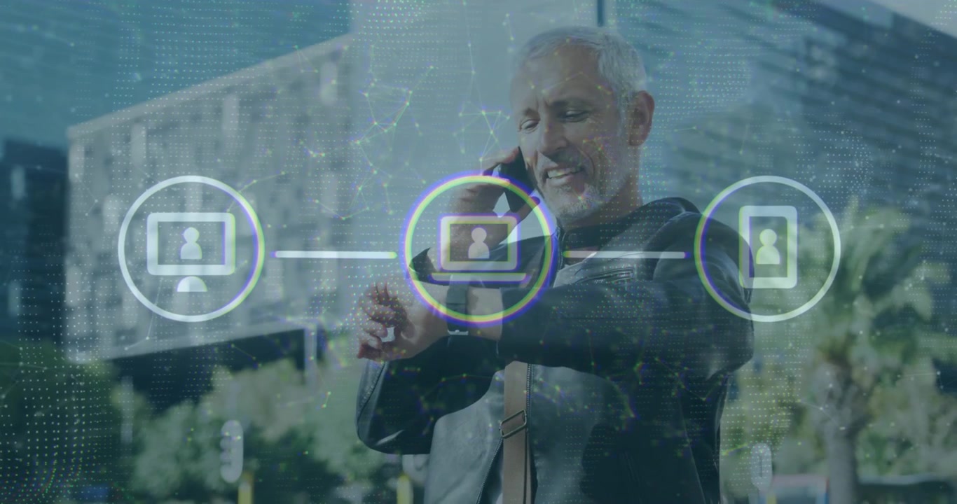 Man placing call on sidewalk animating device icons while monitoring smartwatch technology network