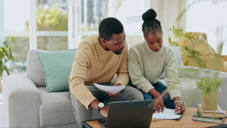 black couple writing, laptop