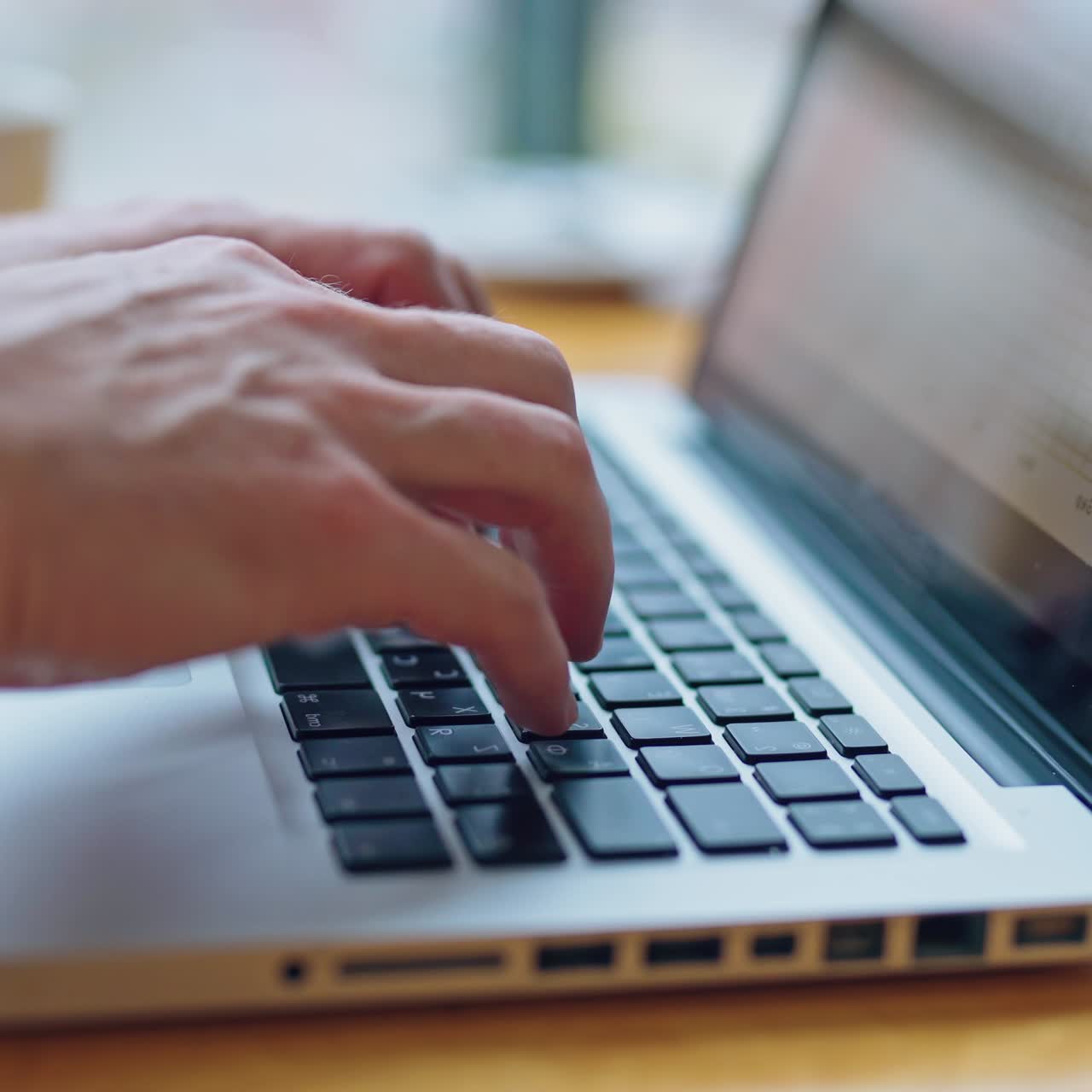 Image of man's hands typing on laptop. Selective focus. Business concept video.