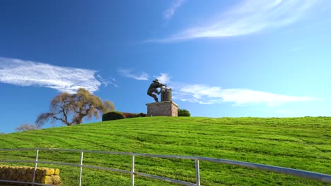 the napa valley, the grape crusher sculpture push back on wide scenic landmark