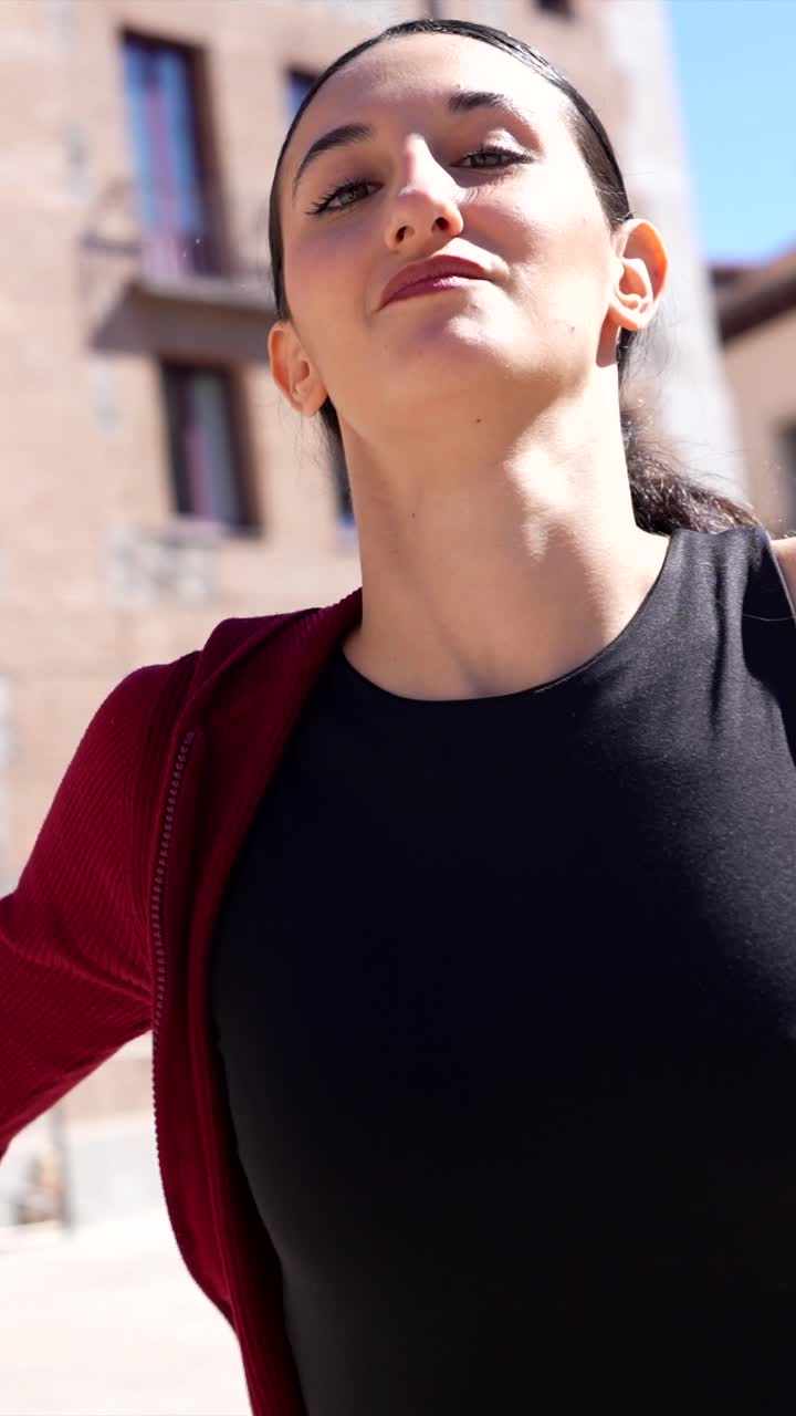 Woman posing in urban setting