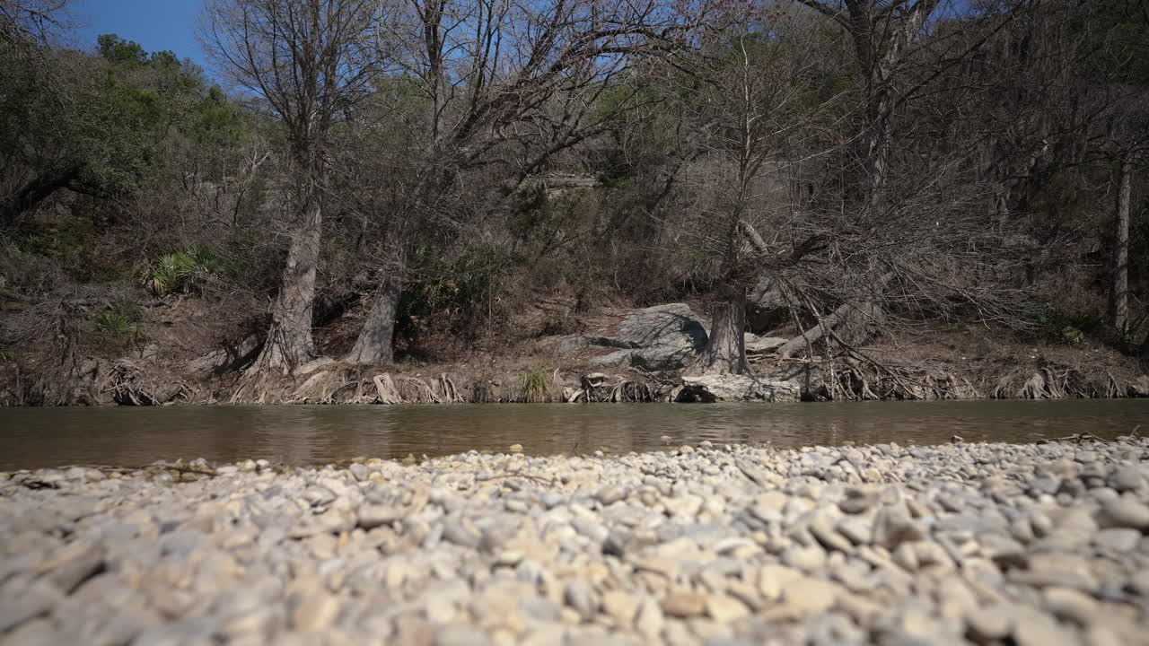 Handheld POV of the Guadalupe River in the Texas Hill Country