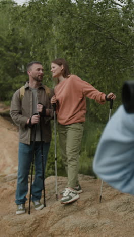 people hiking with binoculars in nature