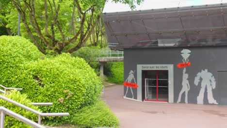 exterior view of a building with robot artwork