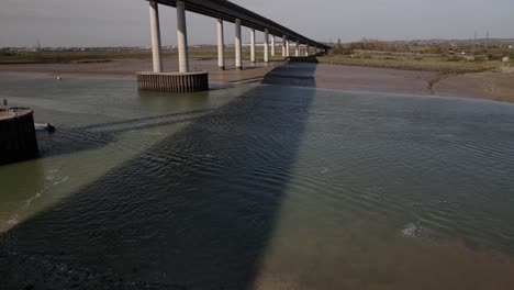 jetski race on the swale channel under the kingsferry bridge and sheppey crossing in england