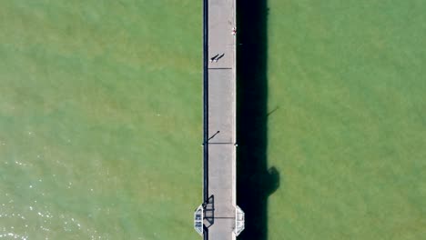 Aerial-Looking-Down-Along-Deal-Pier-Structure-In-Kent