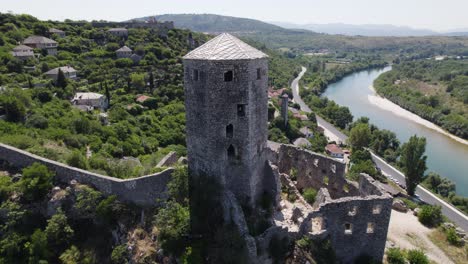 aerial: ciudadela de počitelj con vistas al río neretva, bosnia y herzegovina