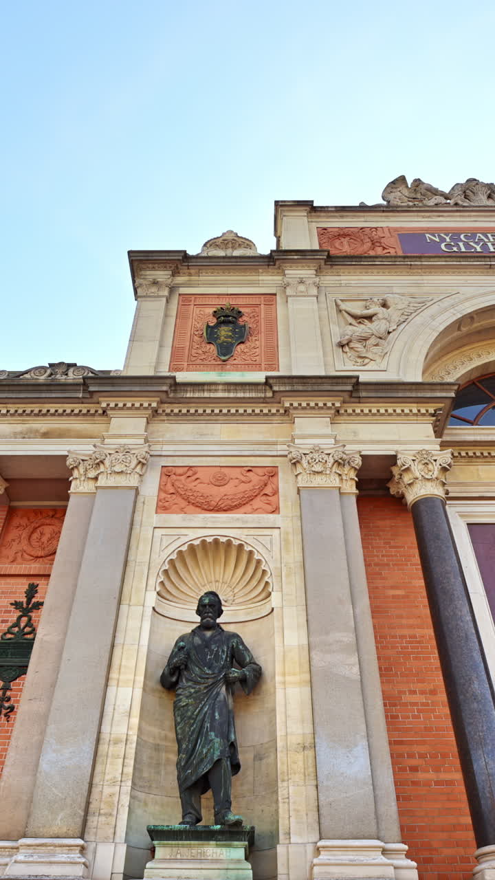 The facade of the Ny Carlsberg Glyptotek art museum in Copenhagen, Denmark. Vertical