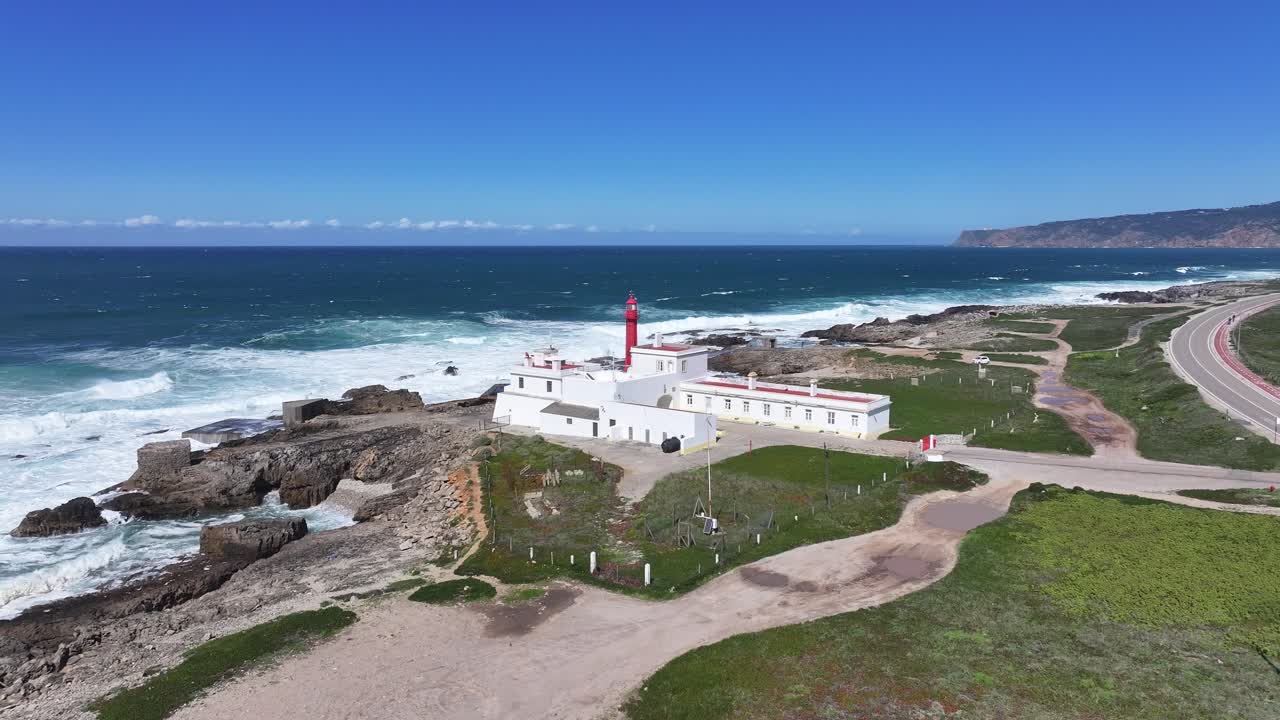 Shallow Cape Lighthouse At Cascais In District Of Lisbon Portugal. Beach Skyline. Lighthouse Landscape. Summer Travel. Shallow Cape Lighthouse At Cascais In District Of Lisbon Portugal