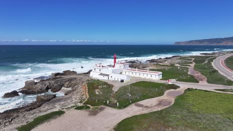 shallow cape lighthouse at cascais in district of lisbon portugal. beach skyline. lighthouse landscape. summer travel. shallow cape lighthouse at cascais in district of lisbon portugal