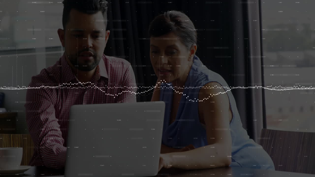 Animation of financial data processing over diverse business people using laptop
