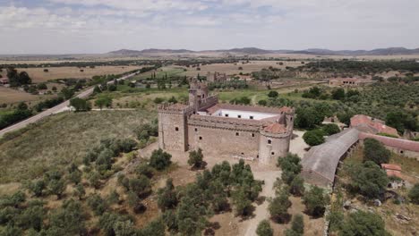 Aerial:-Arguijuela-de-Arriba-castle,-fortified-rural-retreat,-Valdesalor,-Cáceres,-Spain