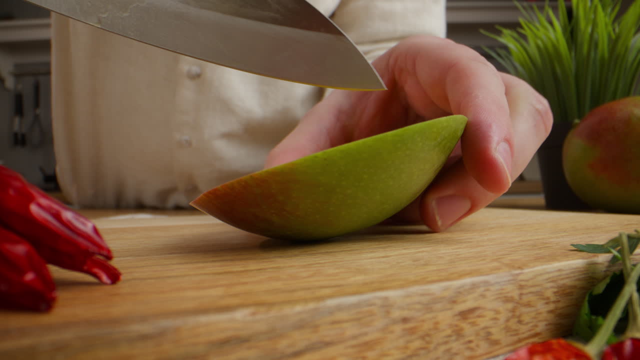 Chef Cutting a Mango