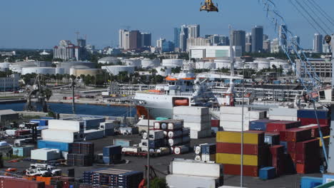 in dynamic commercial video background, container yard is juxtaposed with vibrant skyline, symbolizing economic activity and urban development