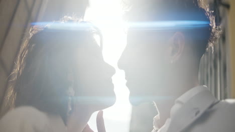 couple kissing in sunlight