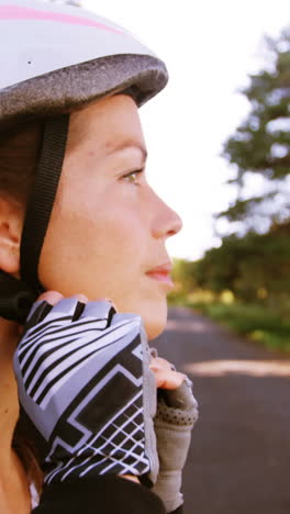 female mountain biker wearing glove