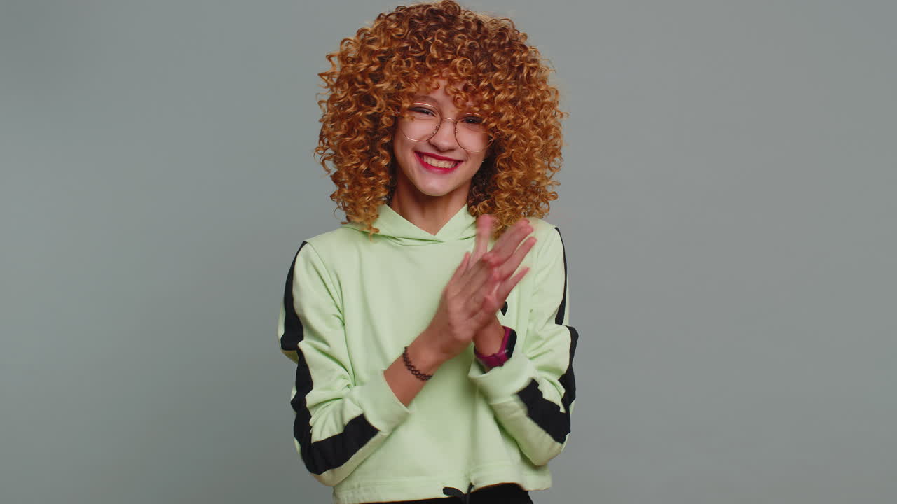 Young teenager child girl kid celebrating success winning birthday lottery jackpot goal achievemen