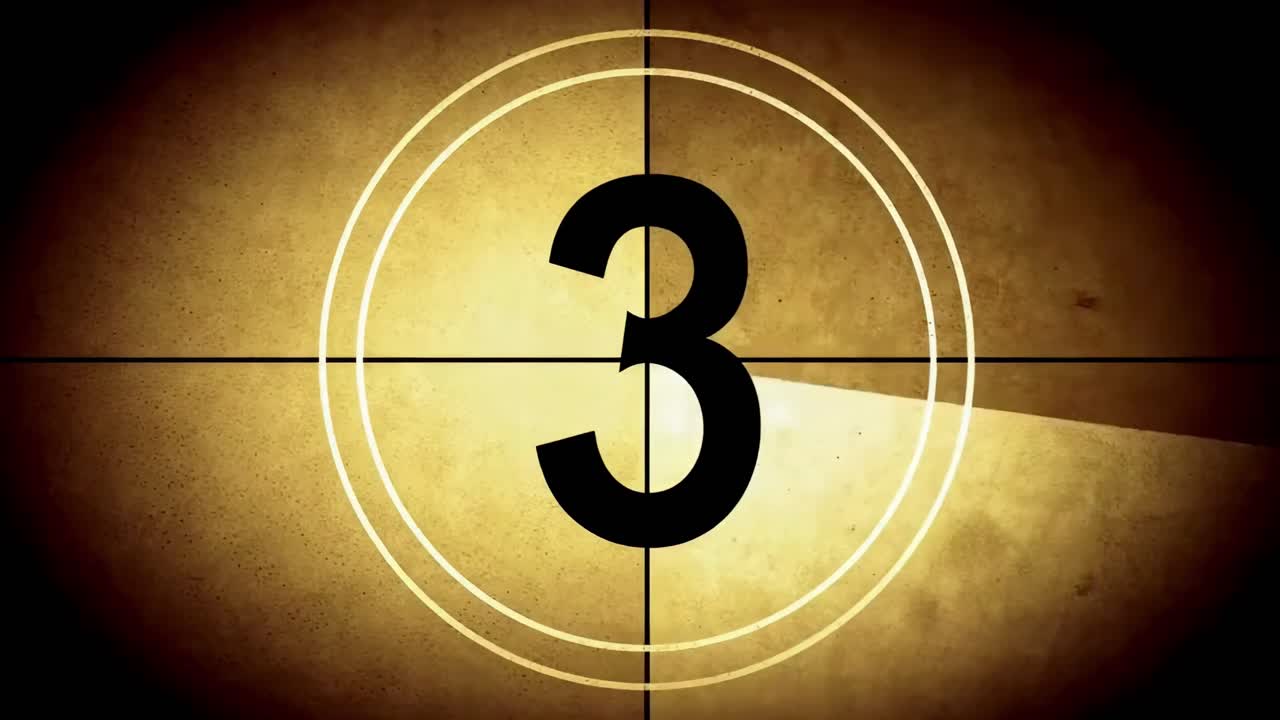 Vintage video aftelling met een sepiatint, recht van voren gefilmd