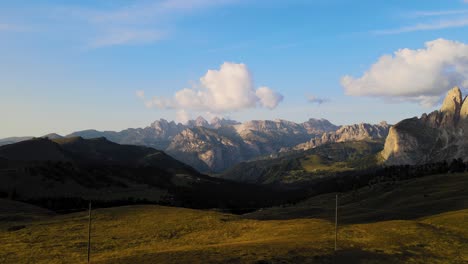 Bright-morning-spectacular-scenery-of-Dolomites-mountain-peaks,-valley,-aerial