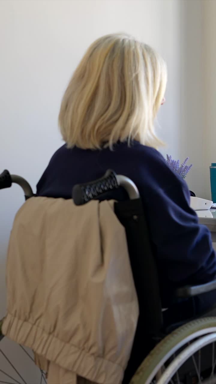 Medical consultation with a doctor and patient in a wheelchair