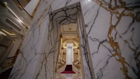 white marble with gold veins creates a stunning visual effect, adding a touch of luxury and sophistication to the interior design of a majestic building