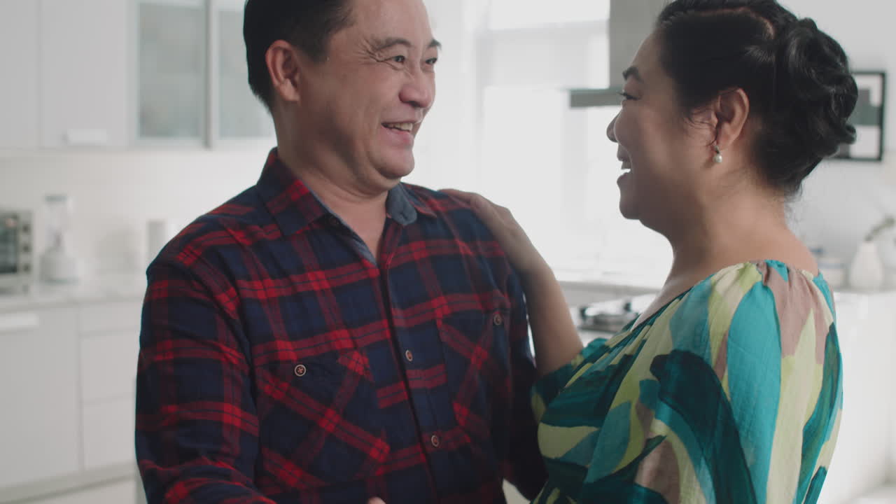 Cheerful Mature Couple Enjoying Romantic Dance