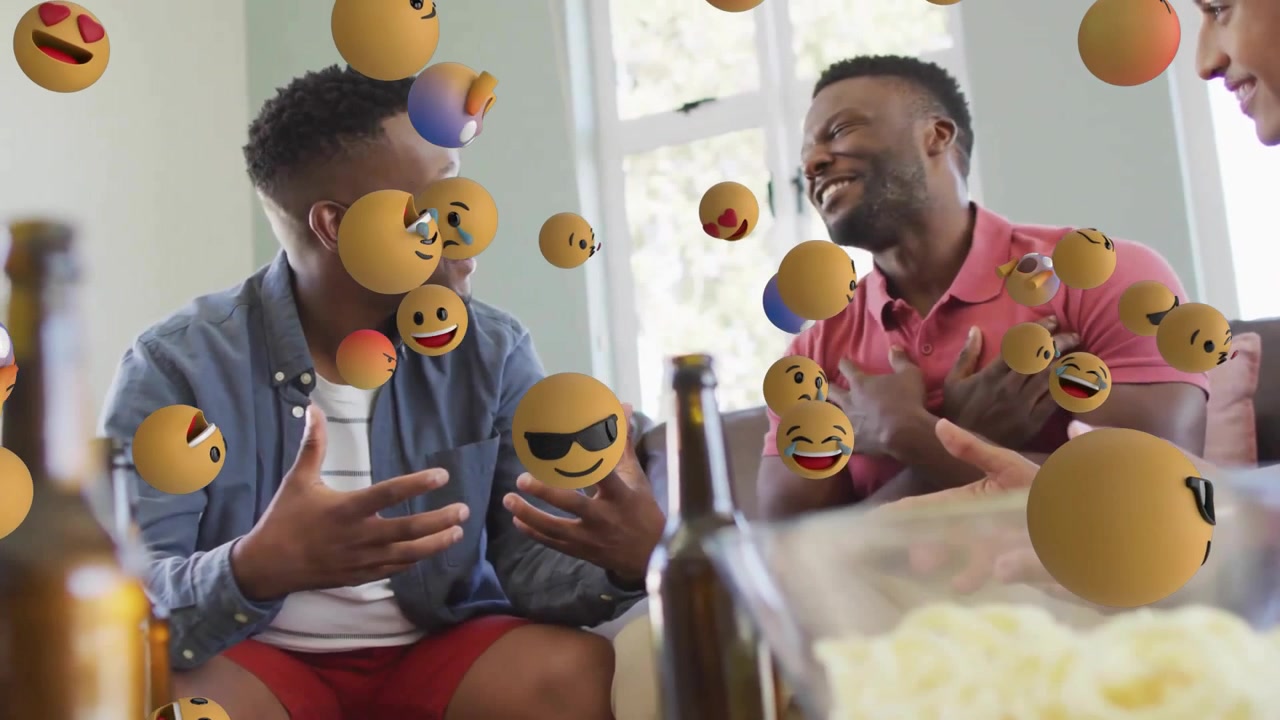 Friends chatting while emojis emerging corner swirling around them showing social media reactions