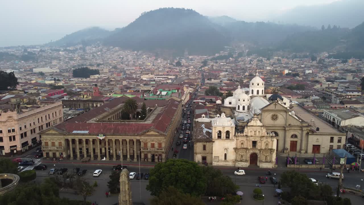 Modern Catholic church built behind fa&ccedil;ade of Quetzaltenango Cathedral
