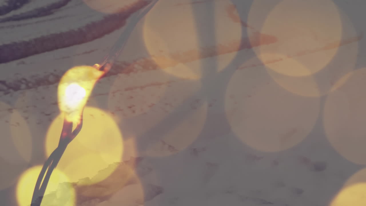 겨울 풍경에 대한 노란색 빛의 점의 디지털 구성