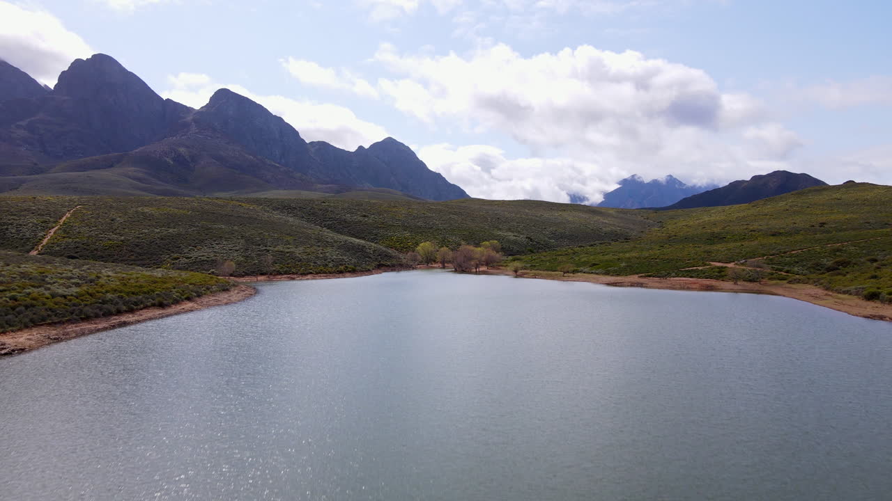 Aerial riser over Foreldam revealing remote countryside and Hex River mountains