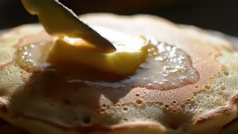 decadent pancakes with melting butter: a close-up journey into the sizzling delights of breakfast cuisine