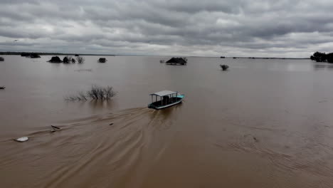 flooded village landscape with boats
