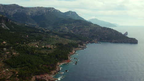 panoramic aerial view of port de soller in tramuntana mountains of mallorca, spain