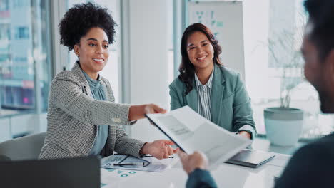 group of diverse professionals collaborating during a business meeting in a modern office