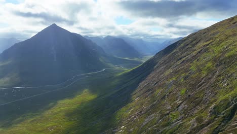 Establishing-shot-of-Glen-Coe,-a-Glen-of-Volcanic-Origins,-in-the-Highlands-of-Scotland,-United-Kingdom